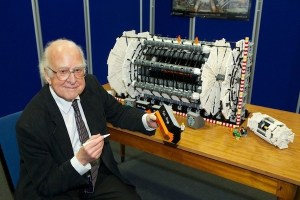 Professor Higgs signing the ATLAS LEGO rebuilt at the University of Manchester.